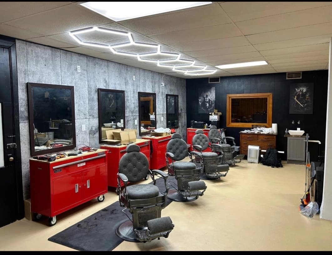 Fade The Grain Barbershop interior with barber chairs and stations